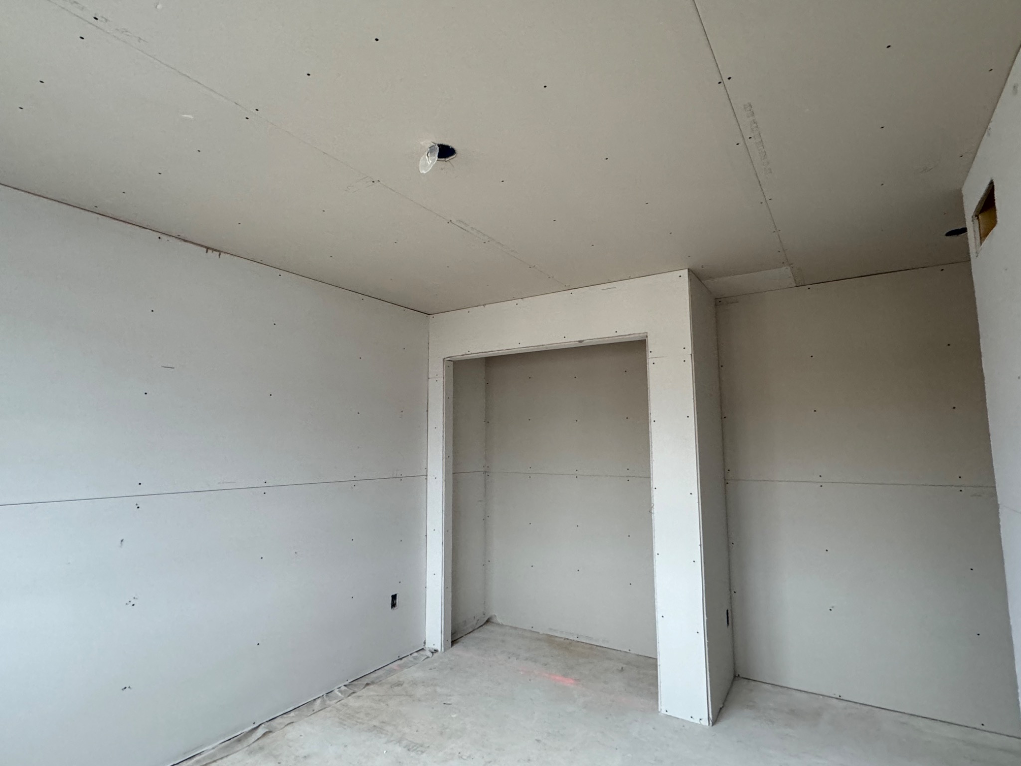 Drywall board installation in an Ottawa custom home