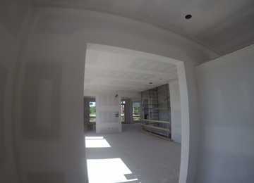 House getting new drywall installed
