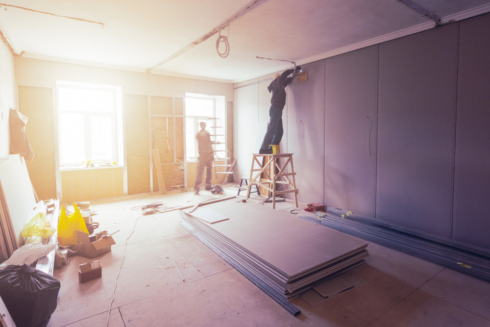 drywall being installed by pros